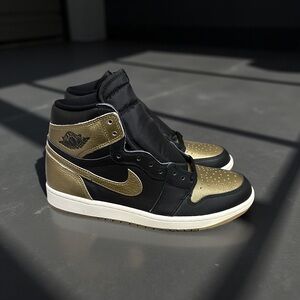 Air Jordan 1 Black and Gold High-Top Sneakers